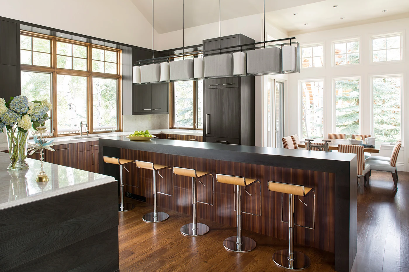 Bachelor Ridge kitchen with rich wood hues and bright countertops