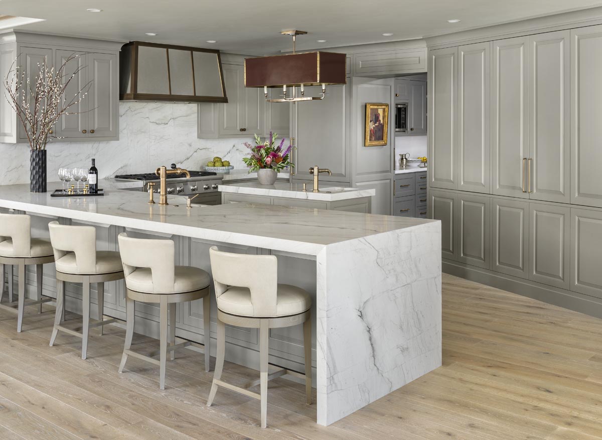 A Penthouse Refined kitchen with aubergine and blue color palette