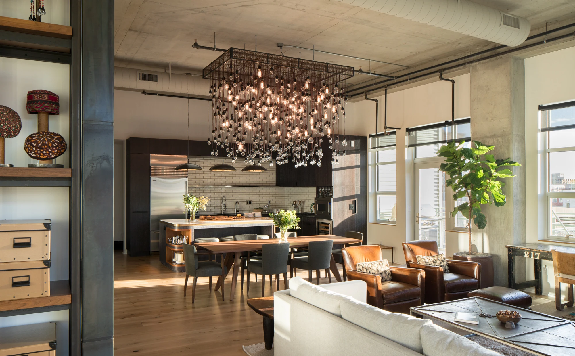 Loft Space kitchen and dining with Alexandre Ferucci chandelier
