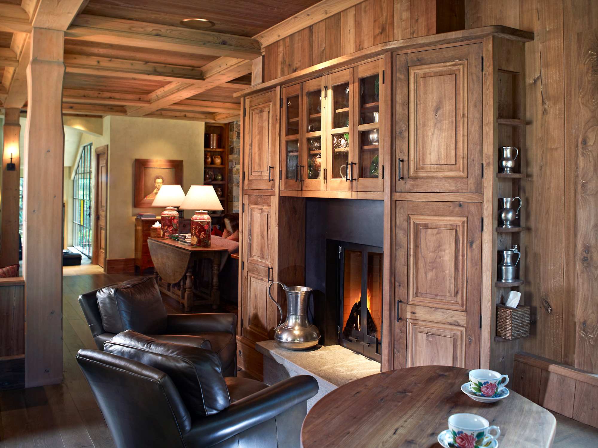 A closeup of the wooden cabinets surrounding the fireplace at hornsilver