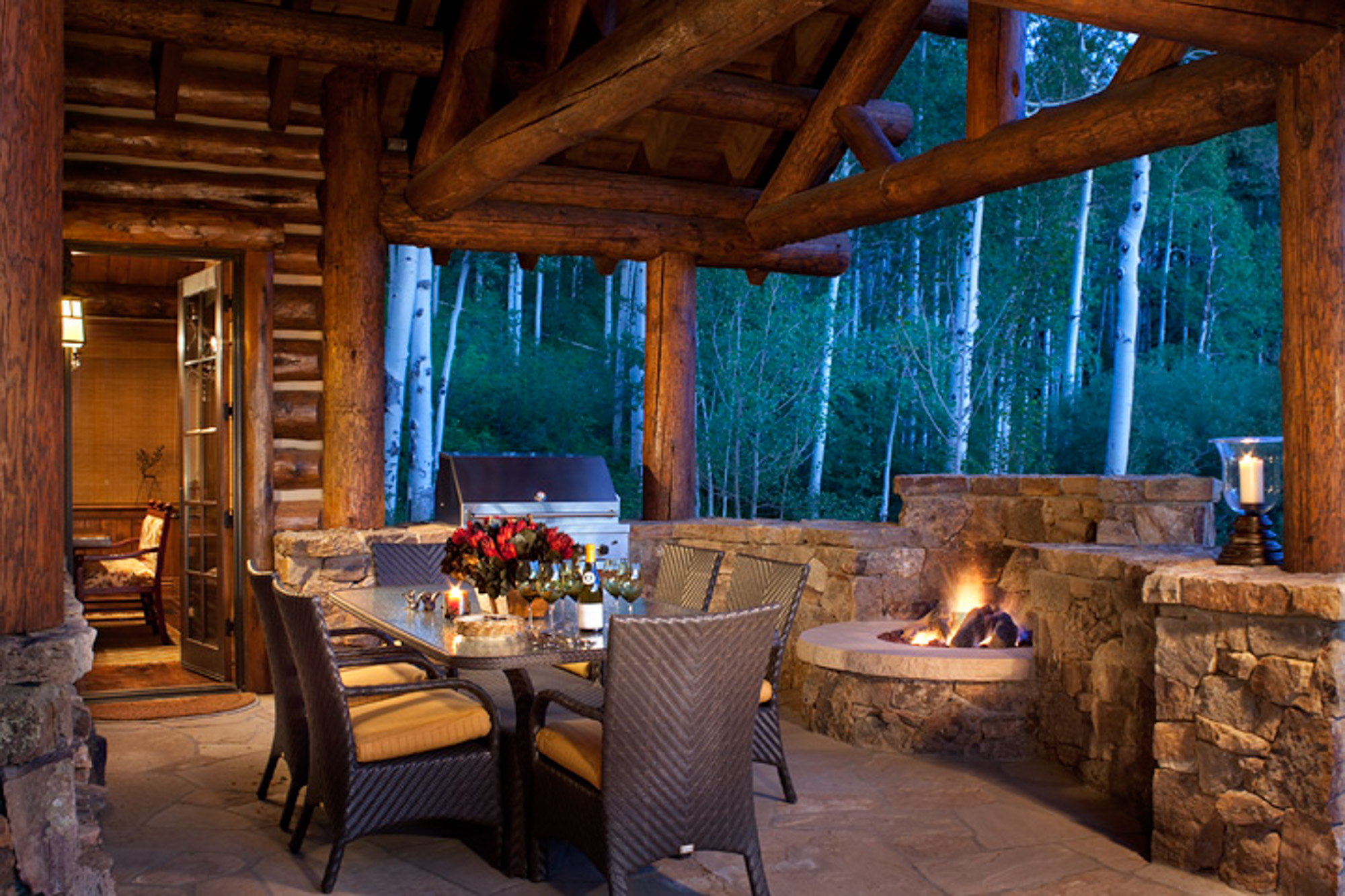 An outdoor deck with a fire pit at bachelor gulch
