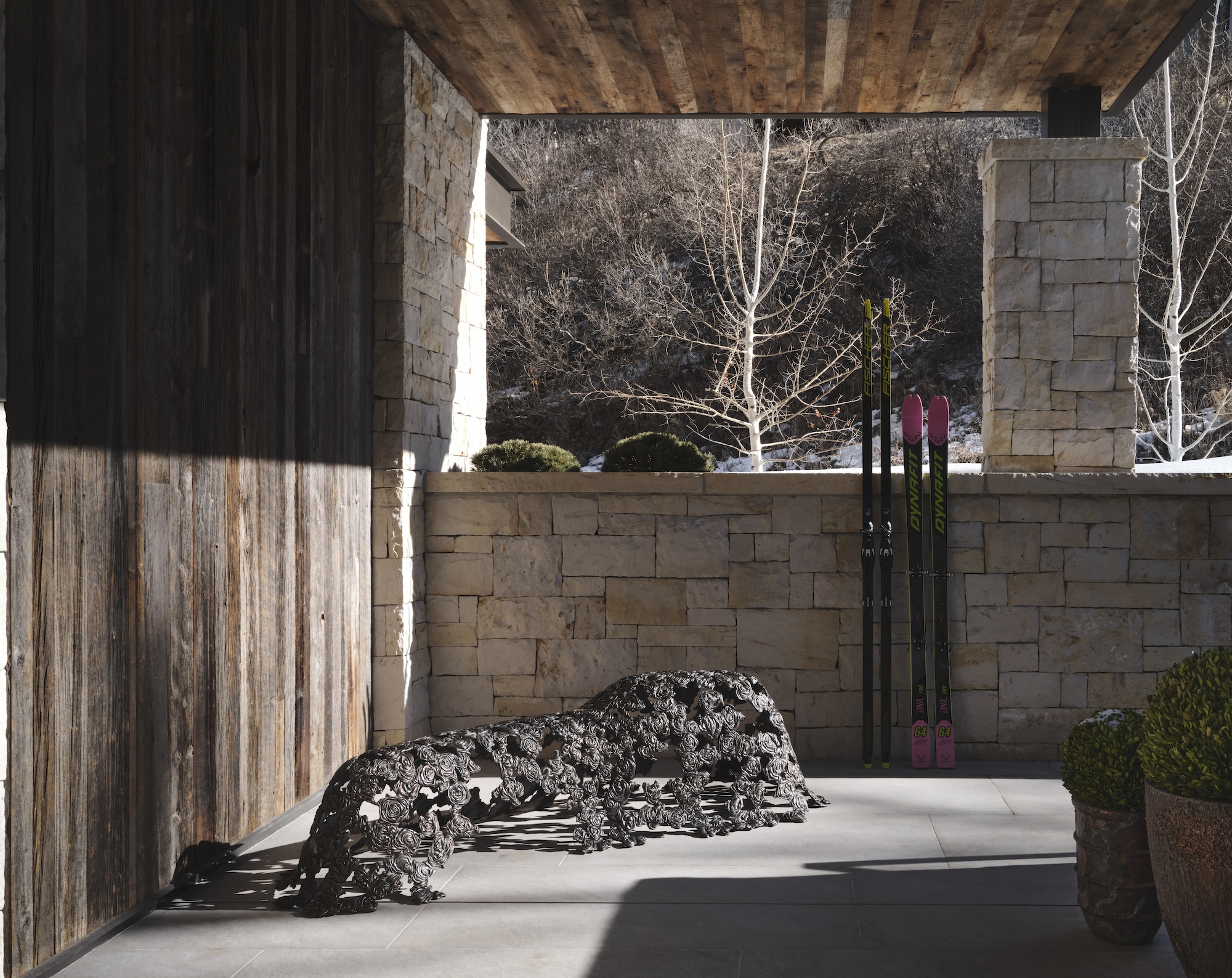 a concrete and stone covered patio at aspen modern