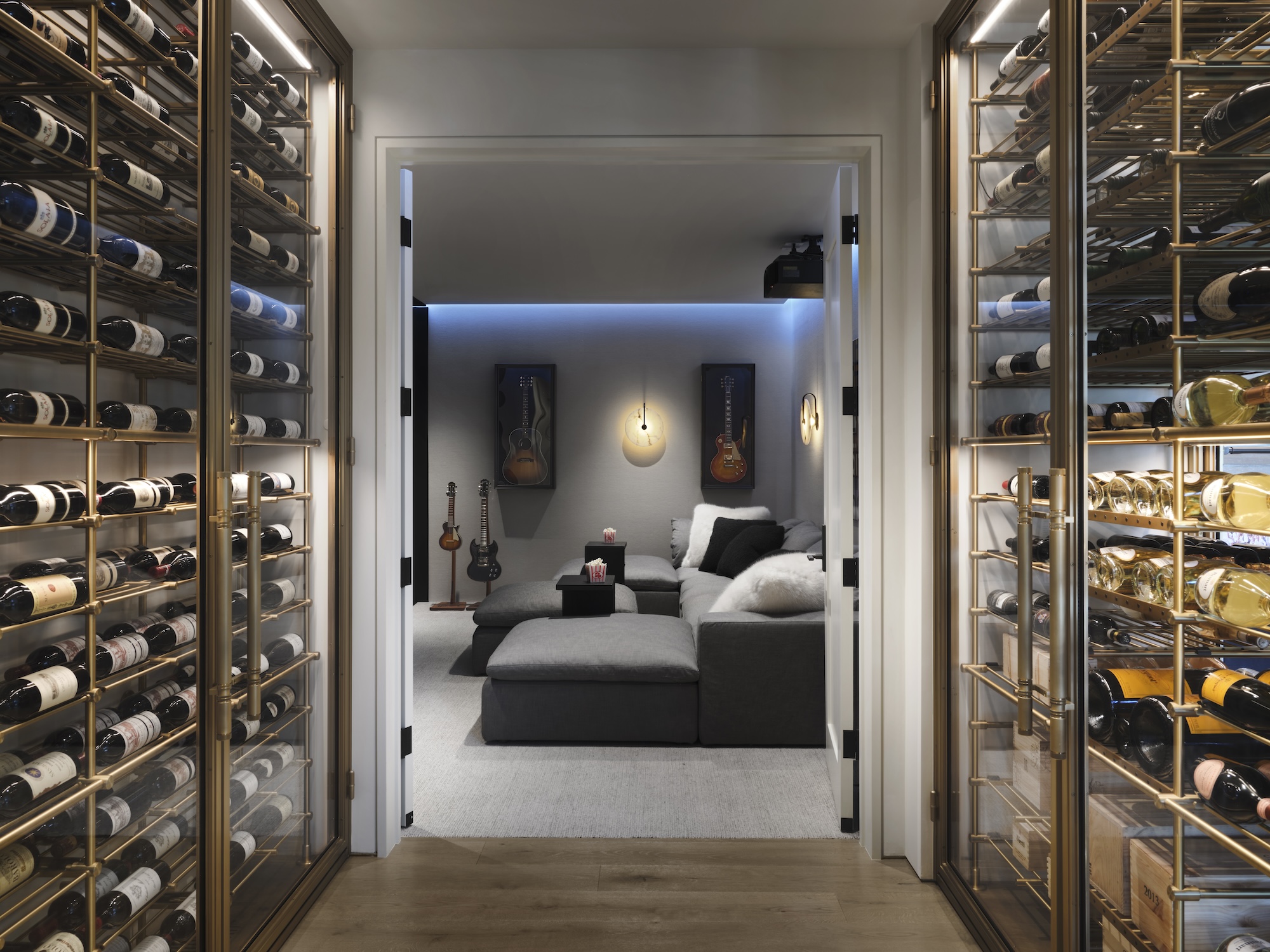 the wine collection into the den at aspen modern